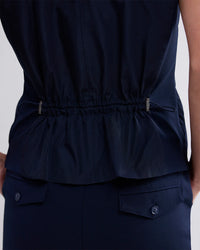 Sleeveless top with taffeta back