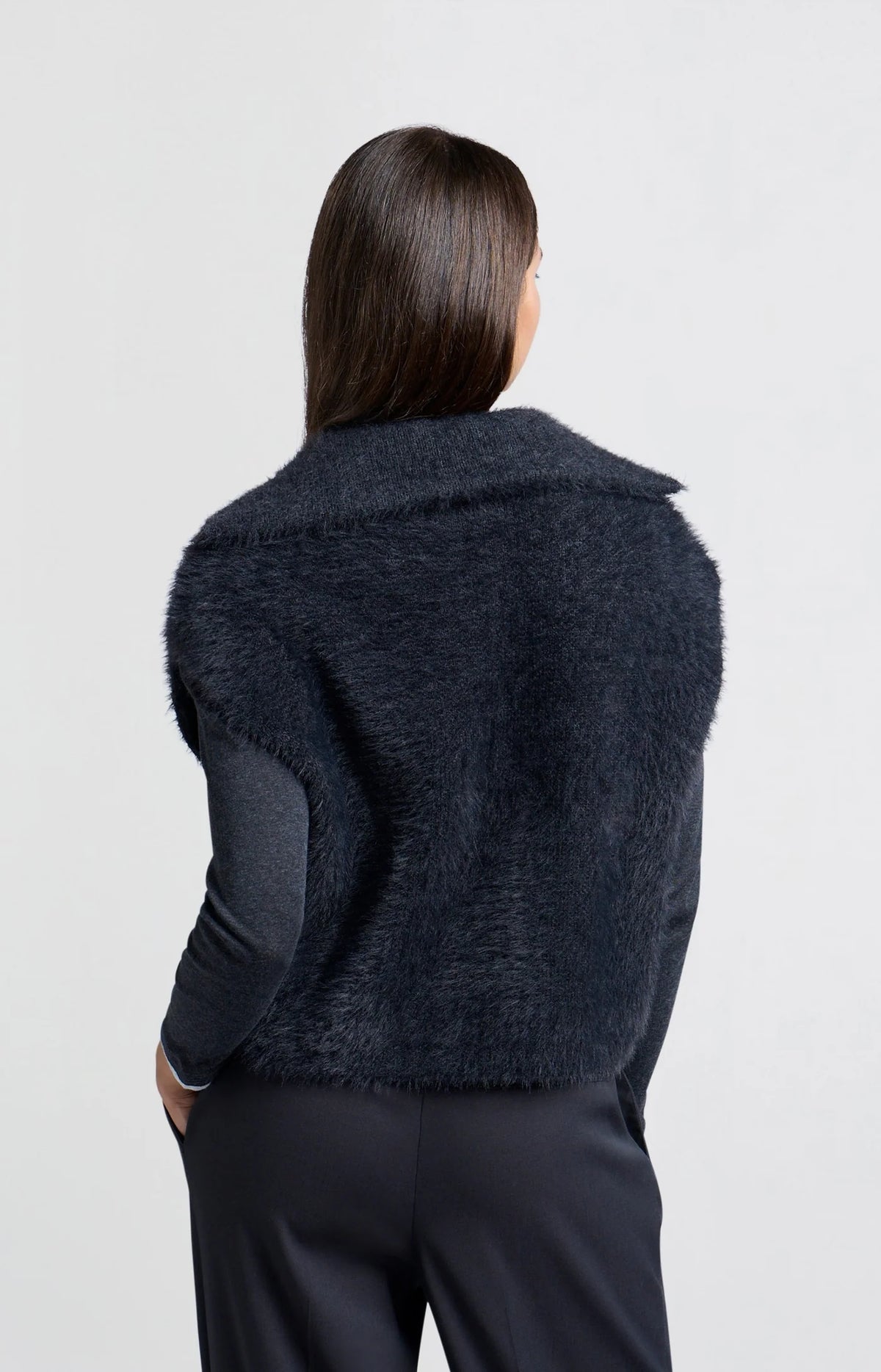 Sleeveless sweater with half zipper