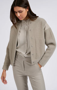 Knitted jacket with high collar