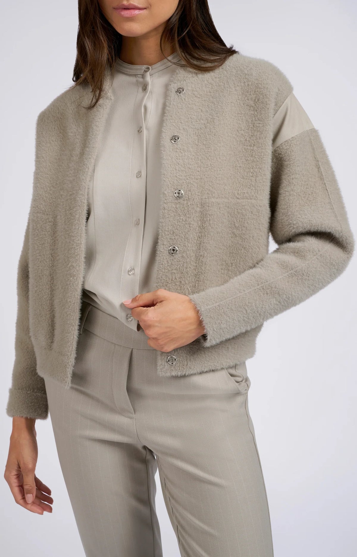 Knitted jacket with high collar