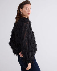 Fluffy blouse with fringe