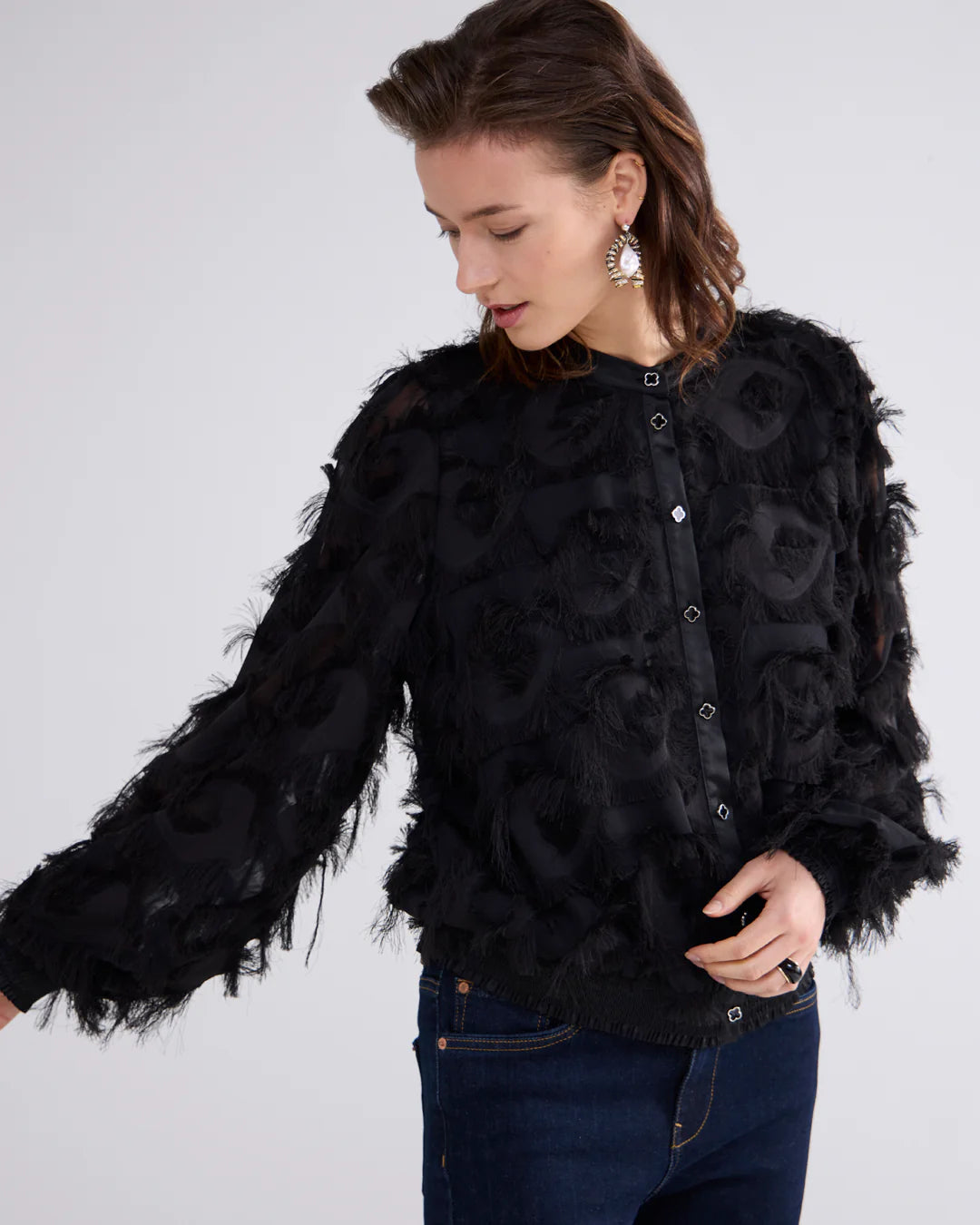 Fluffy blouse with fringe