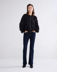 Fluffy blouse with fringe